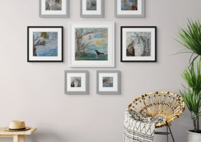 giclée prints from the "birds of whimsy" series arrange on a gallery wall